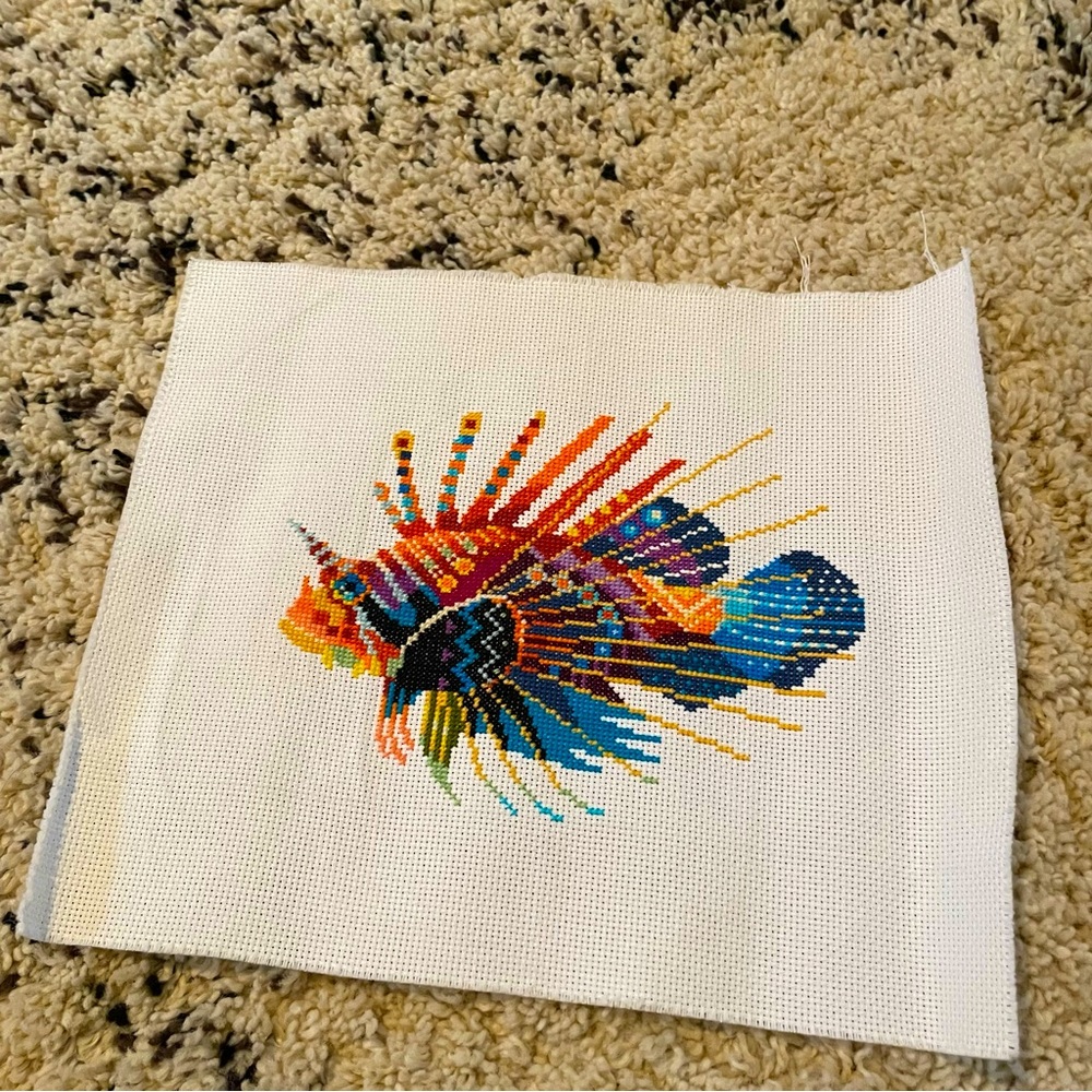 Cross stitch artwork, around 5x7. Tropical fish in abstract colors.